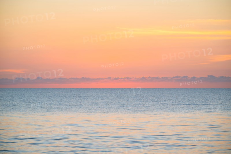 Calm sea at sunrise
