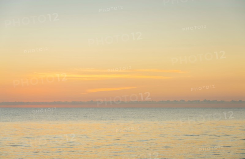 Calm sea at sunrise