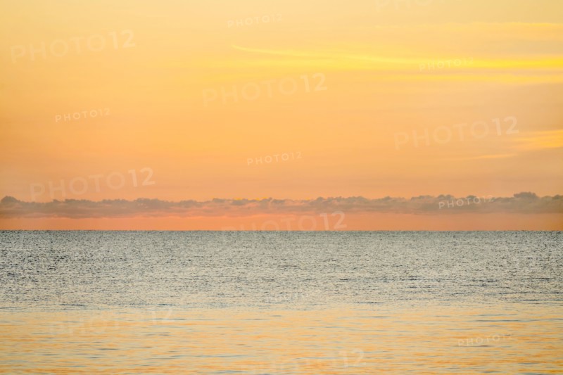Calm sea at sunrise