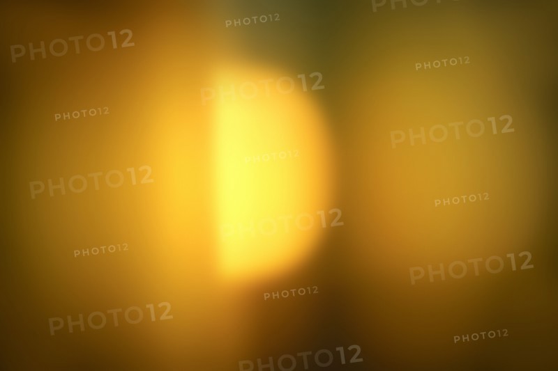 Yellow blurred abstract pattern of light with sun