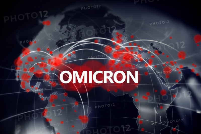 Omicron coronavirus spreading over graphic world map