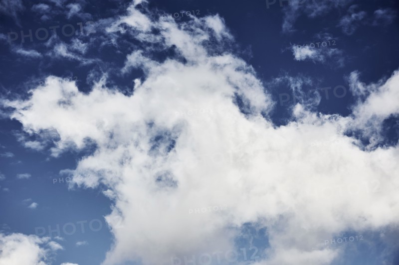 White clouds against blue sky