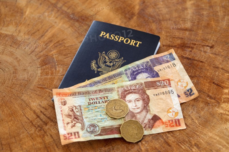 Passport and Belizian currency