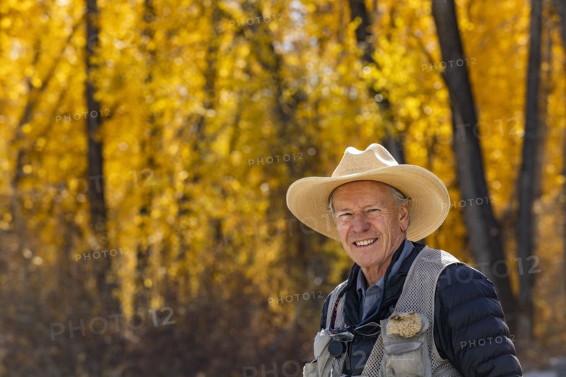 Portrait of smiling senior fisherman
