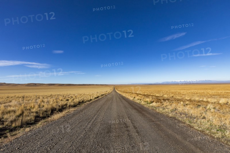 Empty desert road and blue sky