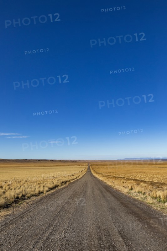 Empty desert road and blue sky