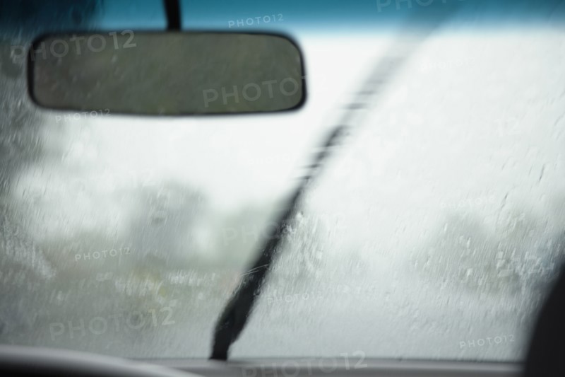 Car windshield in rain
