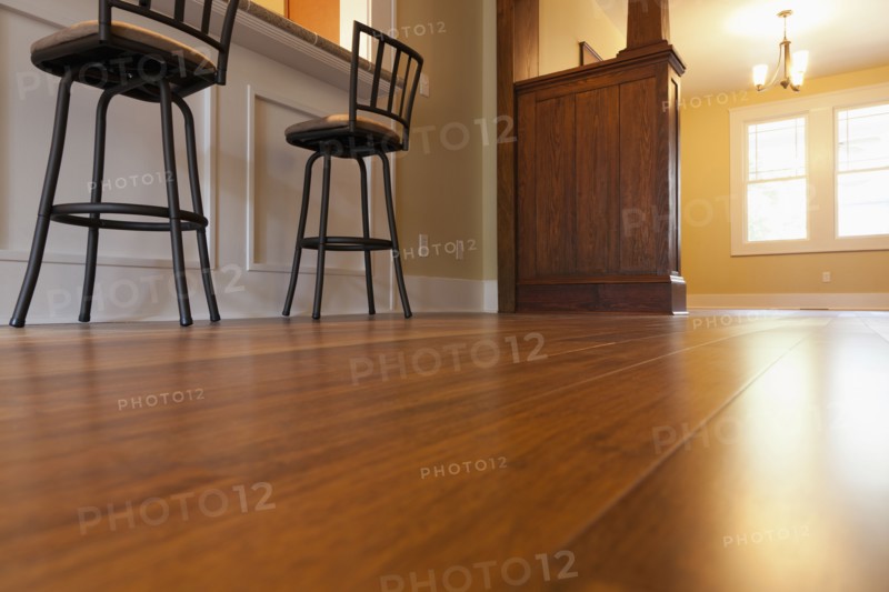 Hardwood floor and kitchen chairs