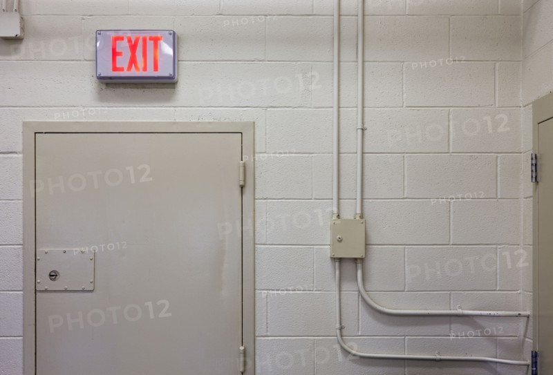 Exit sign in industrial interior
