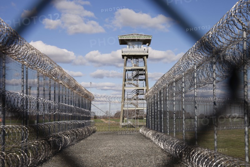 Tower and chainlink fence in prison