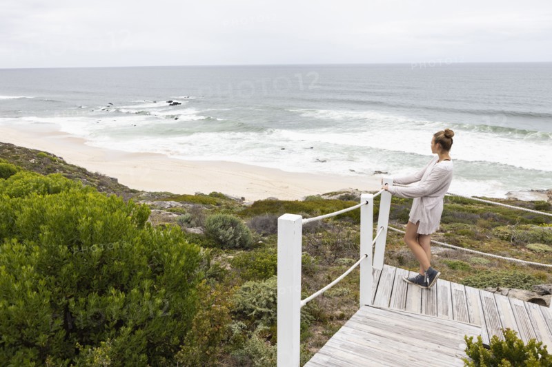 Girl looking at ocean view