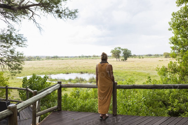 Woman on wooden walkway
