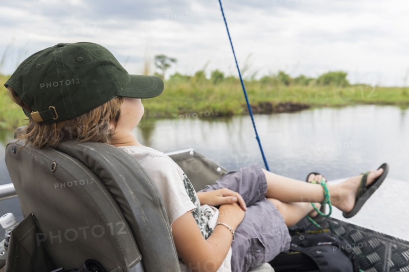 Boy in boat on Zambezi River