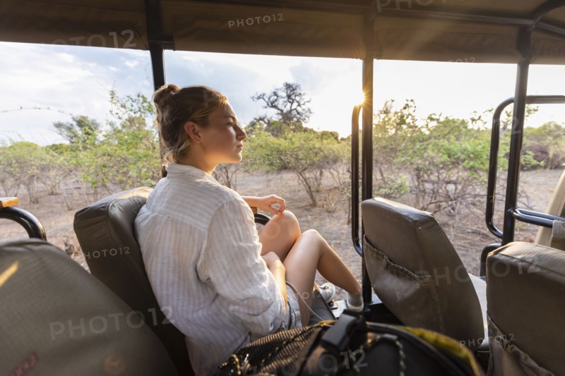 Girl in safari vehicle