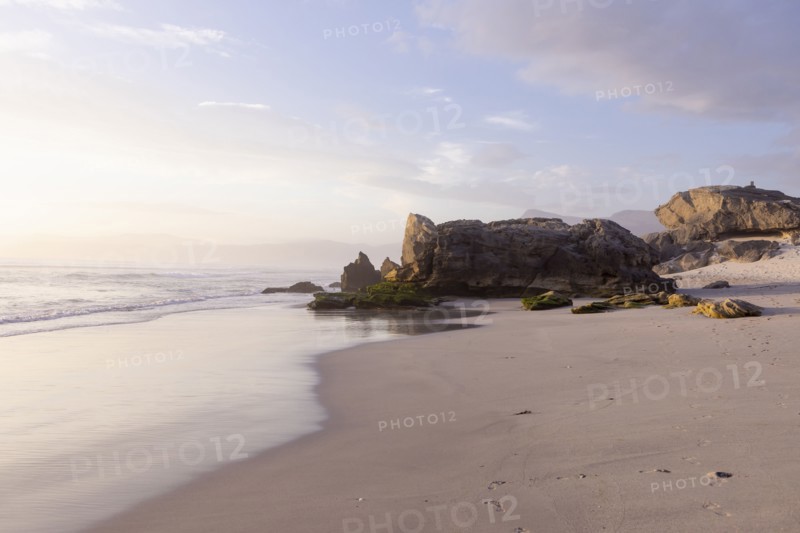Rock formations on Sopiesklip beach in Walker Bay Nature Reserve