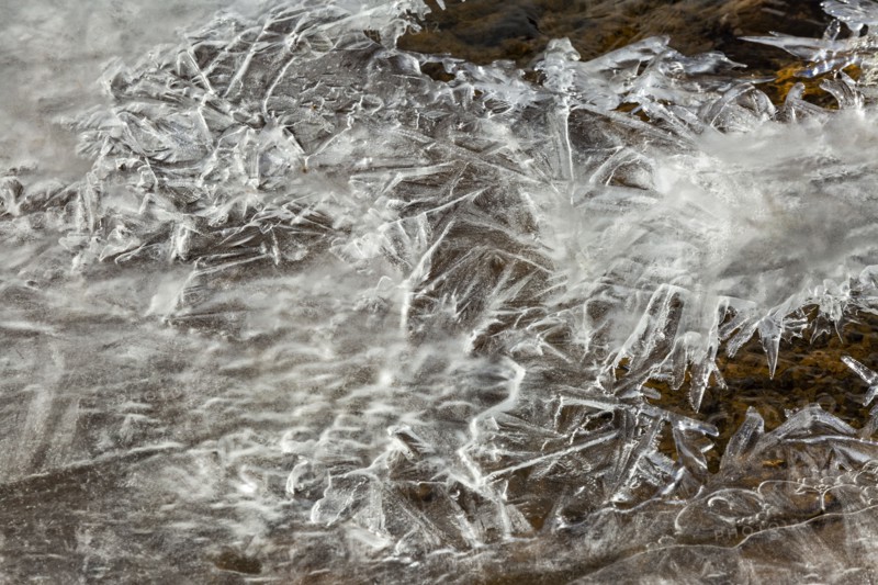 Frozen river surface cracks
