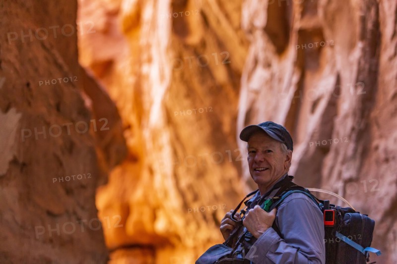 Senior hiker exploring rock formations in Kodachrome Basin State Park near Escalante Grand Staircase National Monument