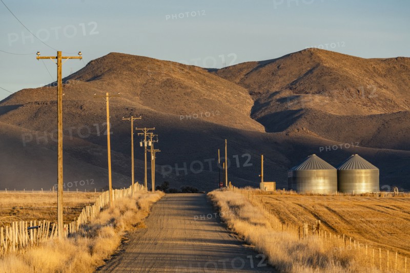 Country road leading to mountains