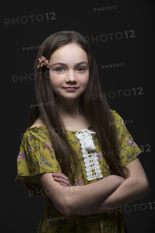 Studio portrait of smiling girl