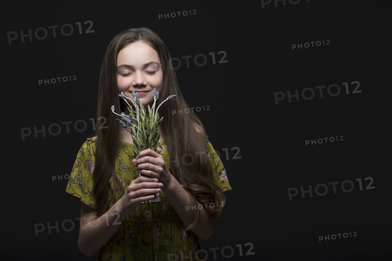 Studio portrait of smiling girl