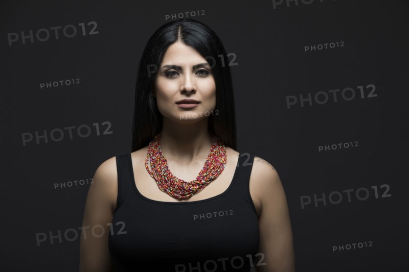 Studio portrait of elegant woman