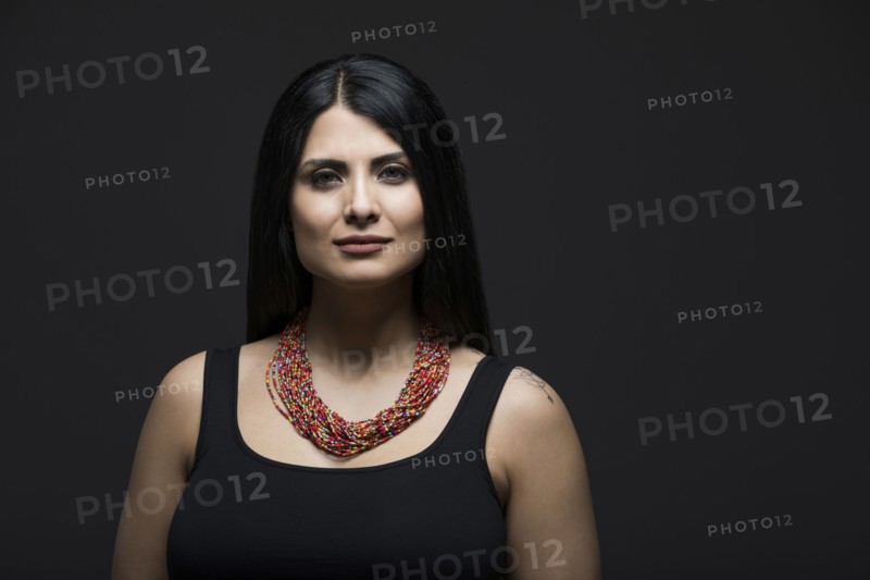 Studio portrait of elegant woman
