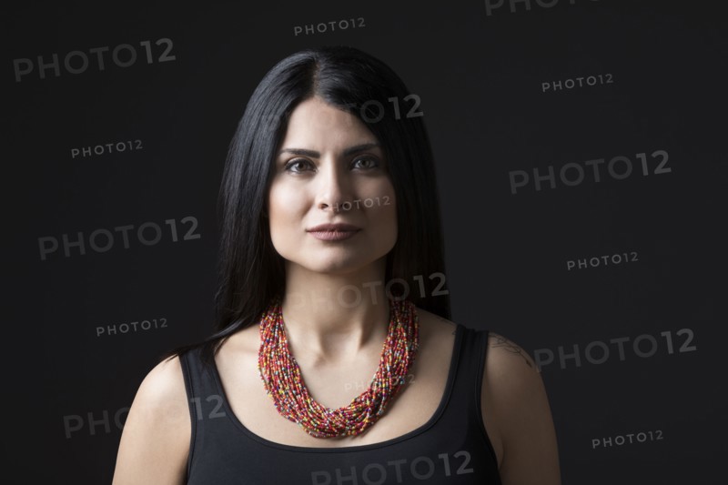 Studio portrait of elegant woman