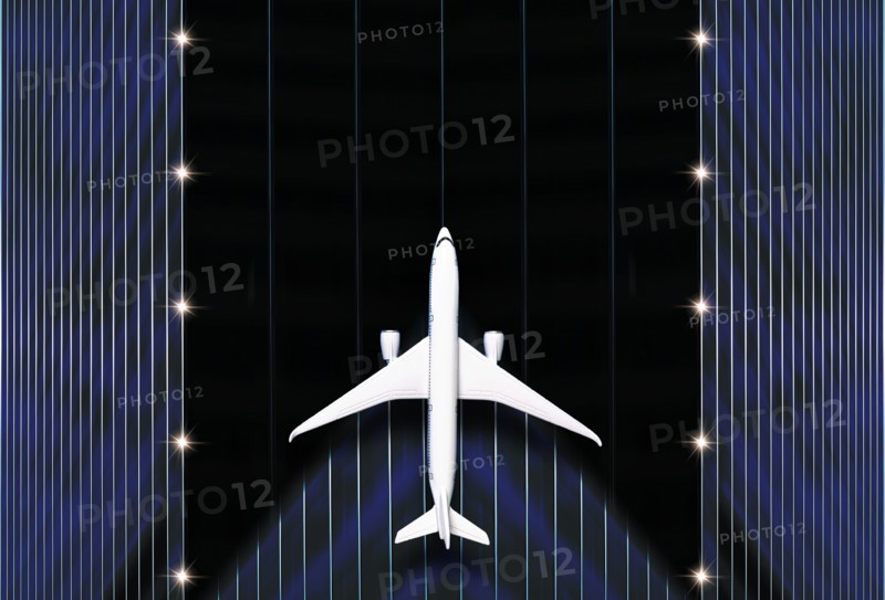 Overhead view of airplane on runway