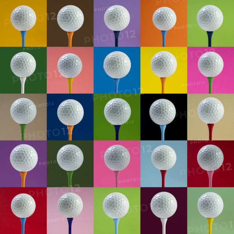 Golf balls on tee against multi colored background