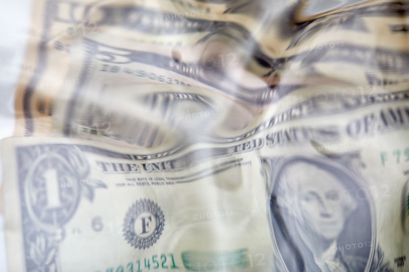 Close-up of distorted US dollar bills