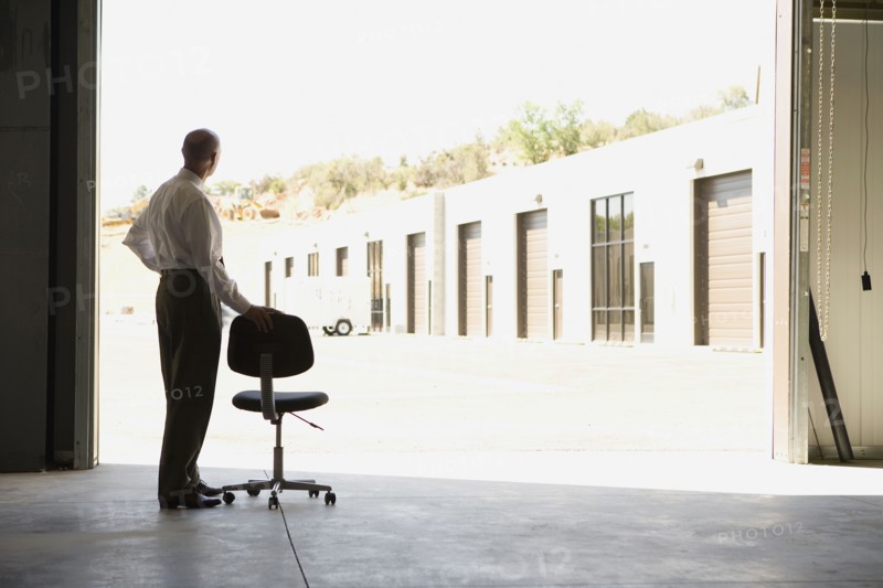 Businessman in warehouse