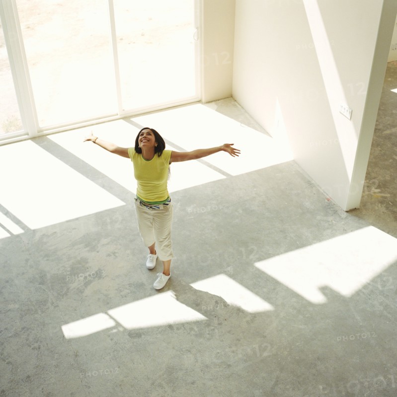 Happy woman in new home