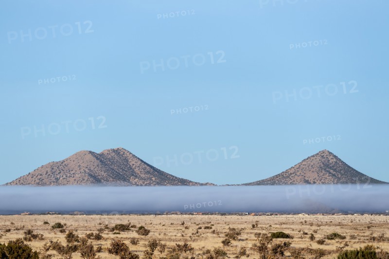 Fog above desert landscape in Cerrillos Hills State Park