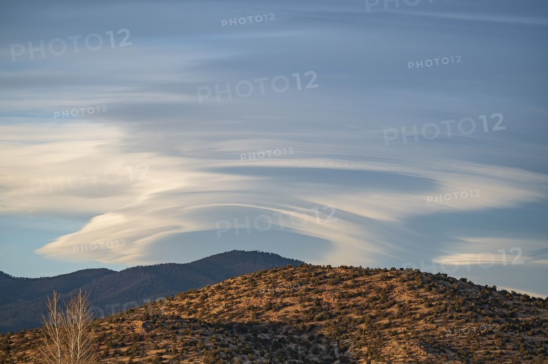 Lenticular cloud over Sangre de Cristo Mountains