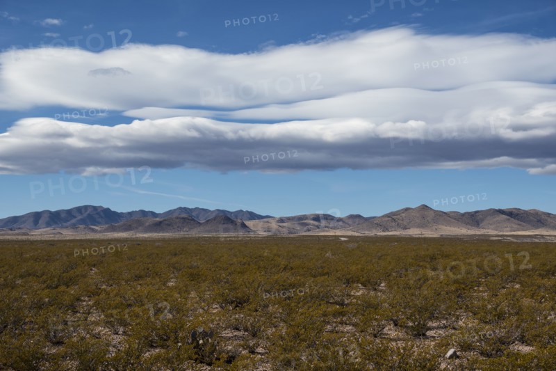 Clouds over desert landscape in Gila National Forest