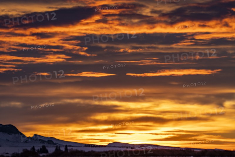 USA, Idaho, Bellevue, Dramatic sunrise sky above snow covered landscape