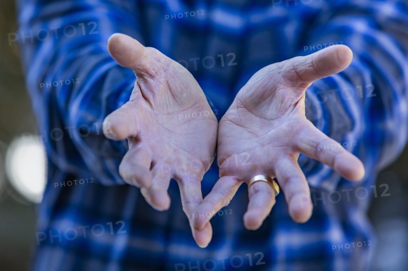 Close-up of senior mans hands