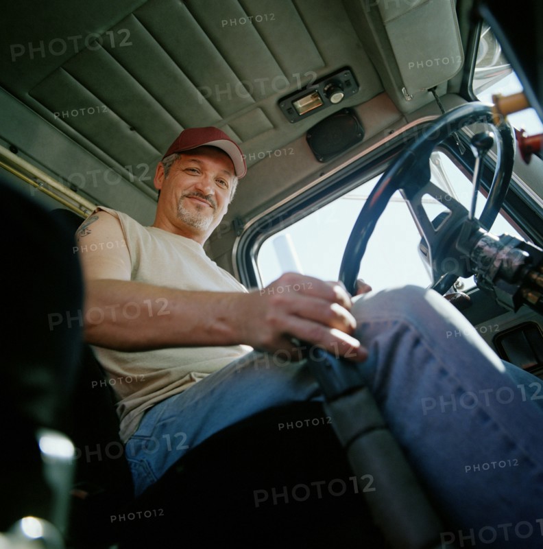 Portrait of happy truck driver