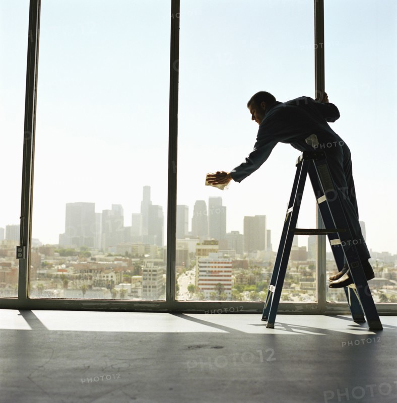 USA, California, Los Angeles, Window washer cleaning windows