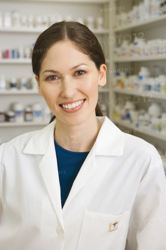 Portrait of female pharmacist in pharmacy