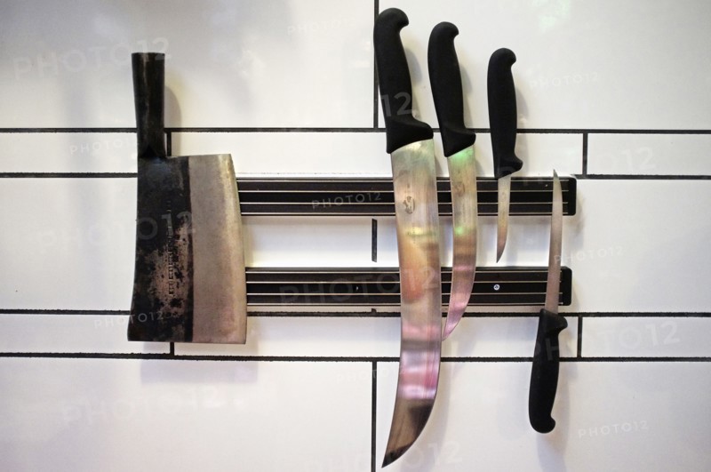 Professional knives on magnetic rack
