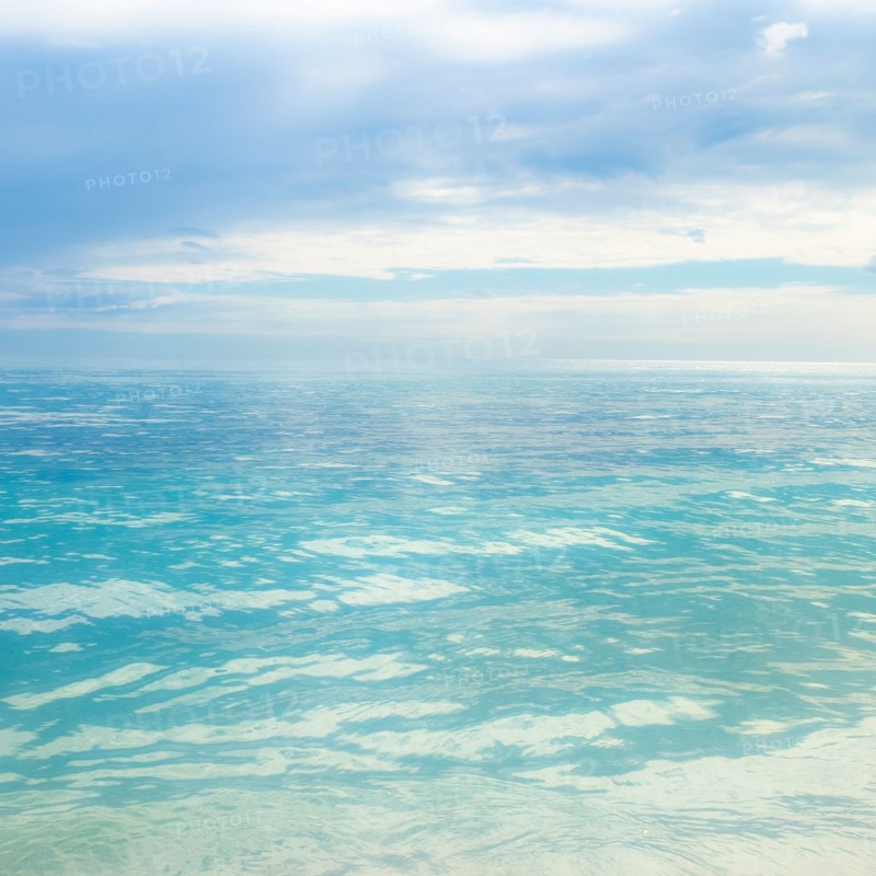 Blue sky over calm sea