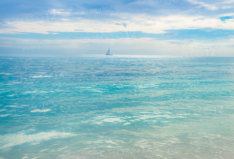 Sailboat over calm sea