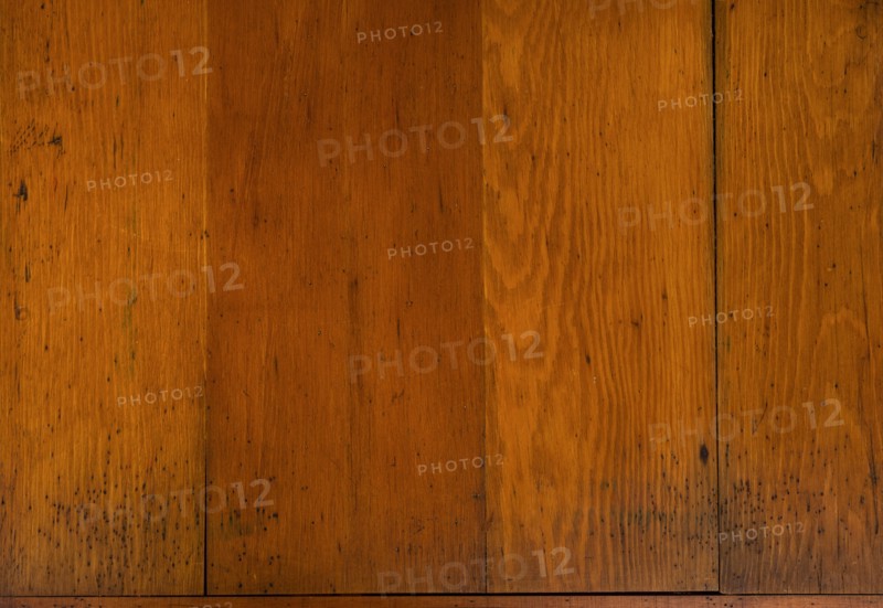 Close-up of worn antique cutting board with knife cut marks