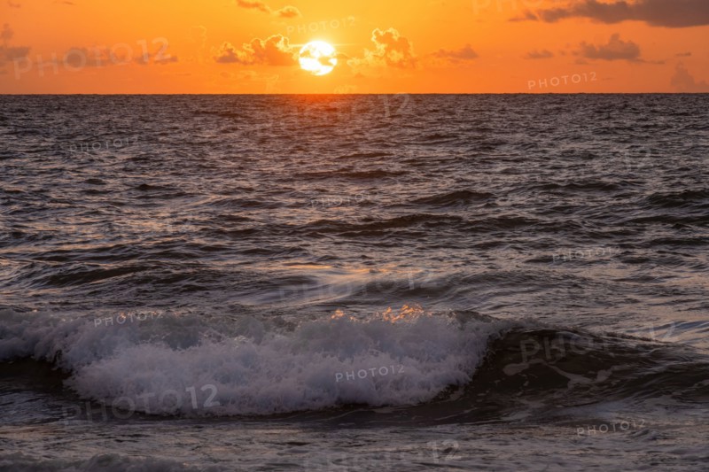 Ocean waves at sunrise