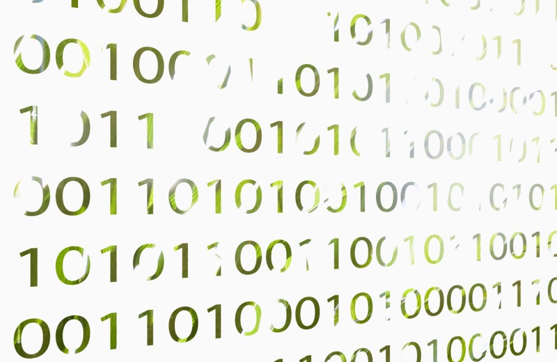 Close-up of binary code on computer monitor