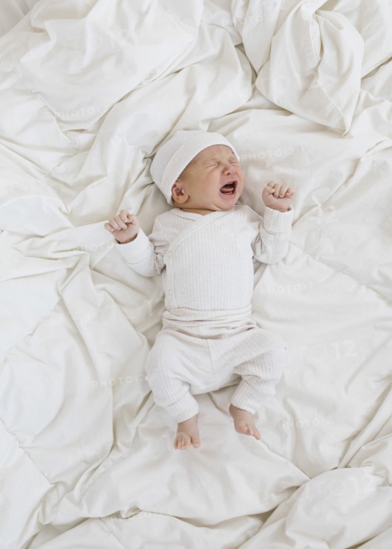 Overhead view of newborn boy