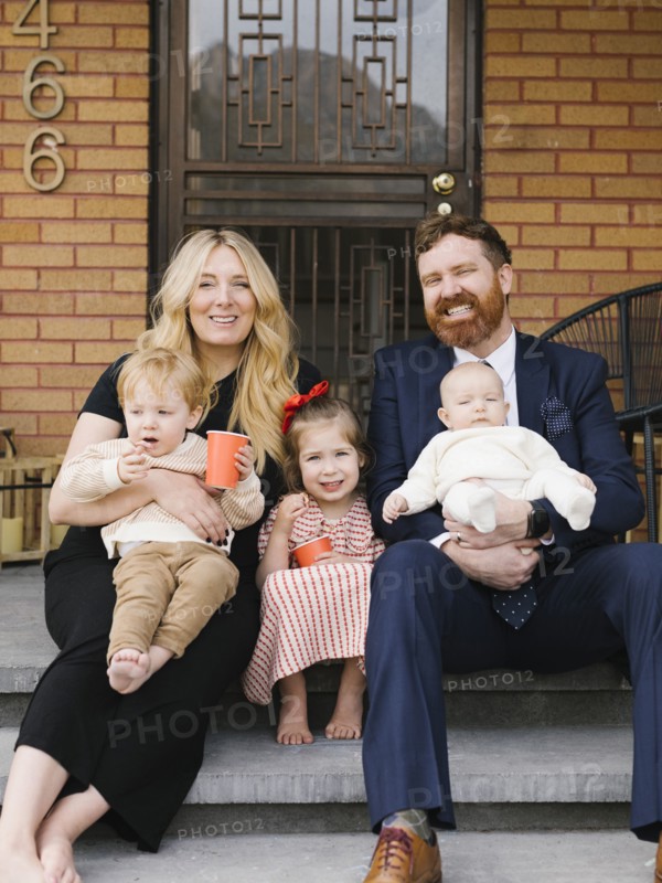 Portrait of parents with three children