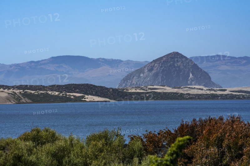 Dormant volcano Morro Rock at entrance to bay