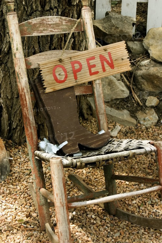 Rustic chair with sign
